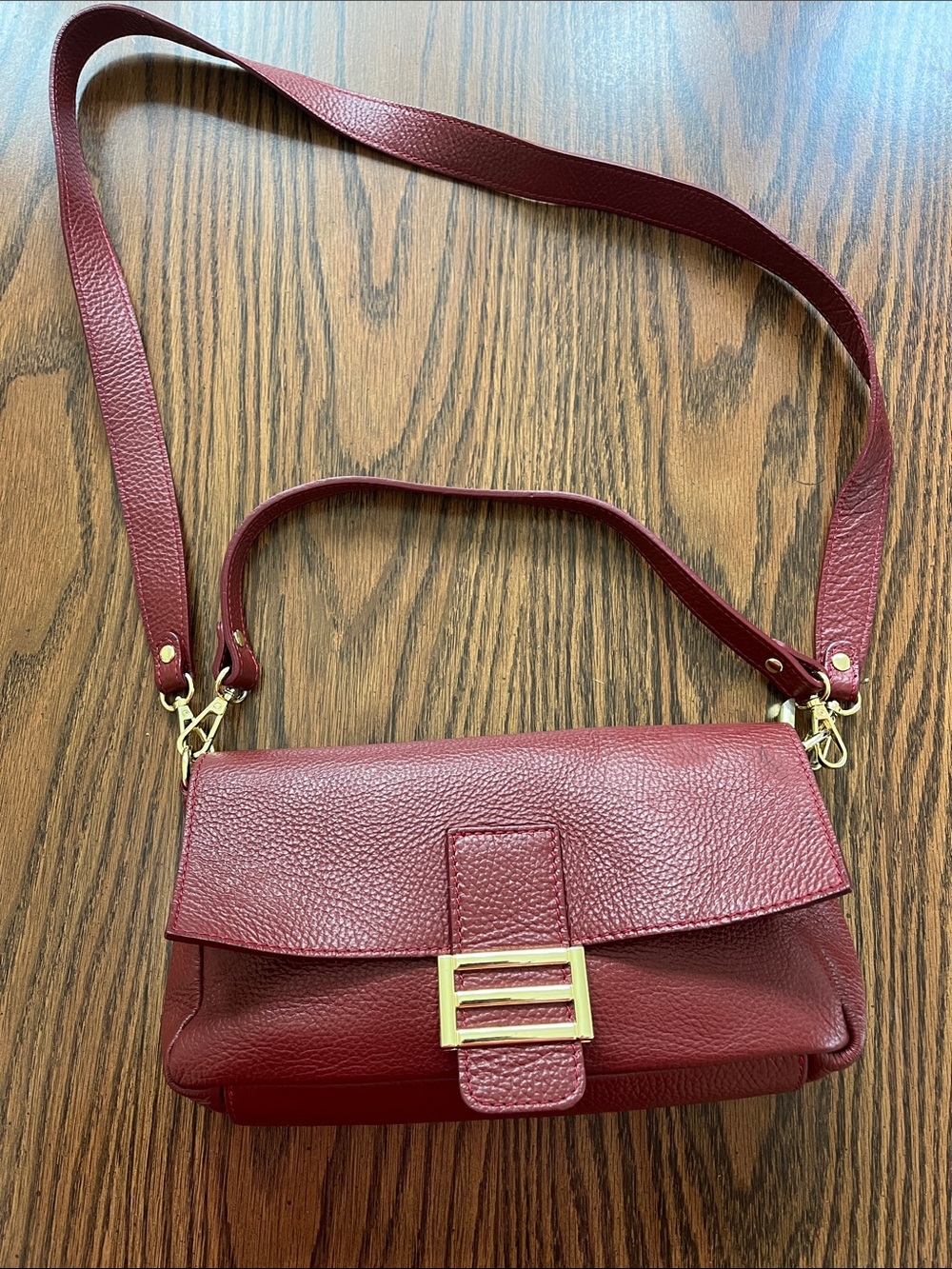 Structured Pebble Leather Crossbody Bag in Deep Red with Gold Accent